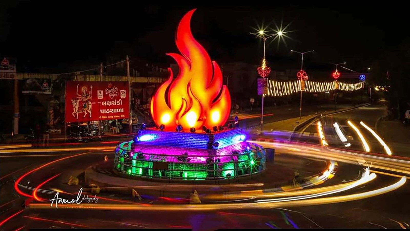 Umiya Circle, Unjha: overhead view of a circular plaza evoking a Yagna Kund with concentric stone rings and central fire pit