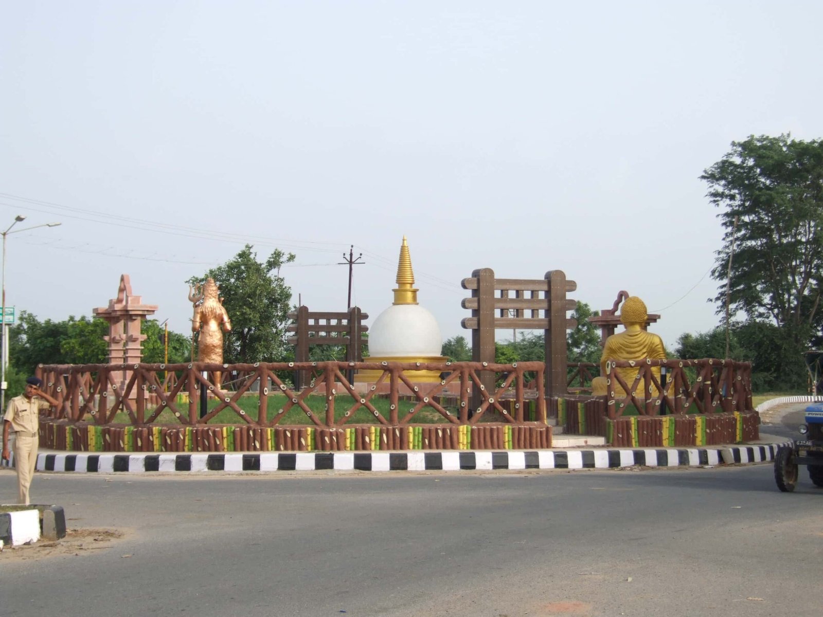 - Vruddhashram Junction, Vadnagar: street-level shot of heritage-inspired arches and carved reliefs reflecting ancient town architecture