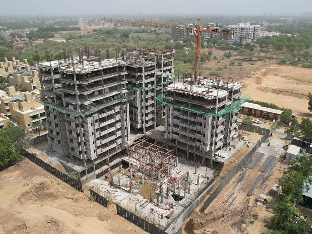 - Arise Ananta – Green Mixed-Use High-Rise in Ahmedabad - Sustainable 2 BHK Apartments & Shops Arise Ananta - IGBC Platinum Pre-certified Arise Ananta Ahmedabad - Radhe Buildcon’s Eco-Friendly High-Rise Arise Ananta - Arise Ananta – Sustainable Mixed-Use High-Rise in Ahmedabad - Eco-Friendly 2 BHK Apartments & Retail at Arise Ananta - IGBC Platinum Green Homes: Arise Ananta by Radhe Buildcon - Arise Ananta exterior with green terraces and modern façade - 2 BHK apartment interior featuring passive design at Arise Ananta - Ground-floor retail shops at Arise Ananta high-rise - Fenestration patterns and broken symmetry on Arise Ananta façade - IGBC Platinum Green Homes certification plaque at Arise Anant
