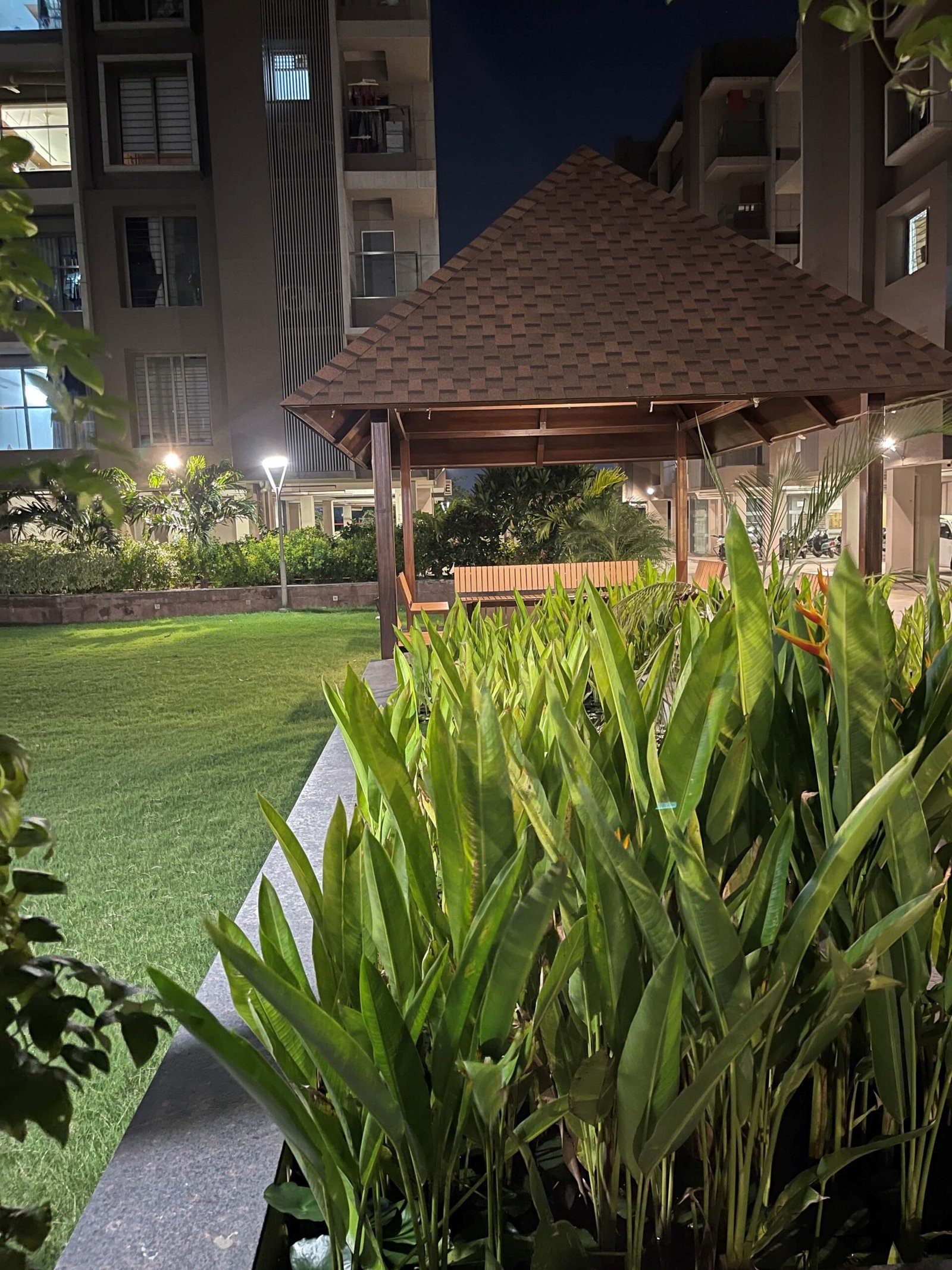 - Arise Florus – Sustainable Luxury Living in Ahmedabad - Arise Florus Eco-Friendly Residential & Commercial Hub - Arise Florus Ahmedabad – Green Design & Modern Comfort - Modern Architecture & Green Living Arise Florus - Arise Florus – Eco-Conscious Architecture in Ahmedabad - Sustainable Residences & Commercial Spaces Arise Florus - Modern Luxury Meets Green Living at Arise Florus - Front view of Arise Florus with landscaped green lawns - Child playing in playground at Arise Florus community garden - Senior citizens enjoying seating area amidst Arise Florus greenery - Panoramic street-facing fenestration at Arise Florus apartments - Solar panels and rainwater harvesting setup at Arise Florus