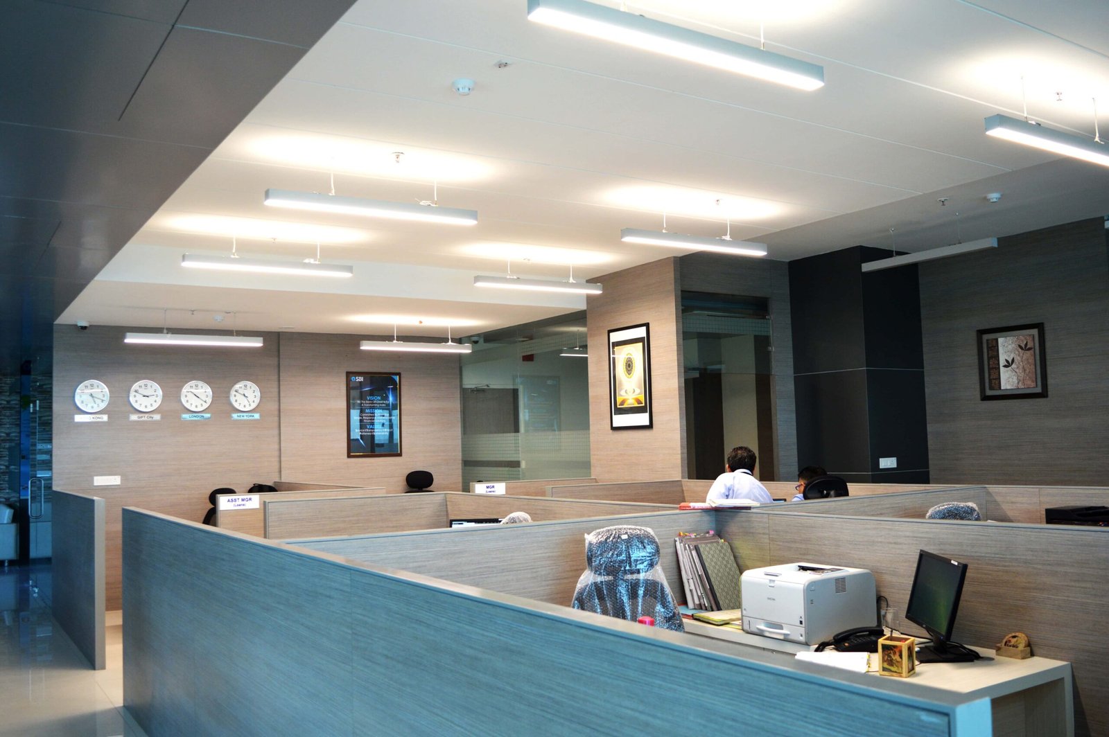 - Interior view of SBI IFSC Unit office featuring modern workstations and collaborative spaces - Ergonomic office furniture and branded design elements at SBI IFSC Unit, GIFT City - Corporate meeting room with contemporary design at SBI IFSC Unit, Gandhinagar - Reception area of SBI IFSC Unit showcasing brand-integrated interior design - Workspace layout at SBI IFSC Unit optimized for efficiency and employee comfort