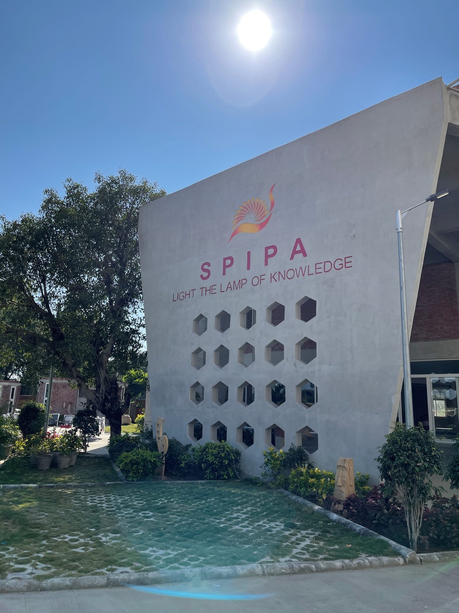 - SPIPA Regional Training Centre, Mehsana – Architecture & Design - SPIPA Mehsana Hub Architecture, Interior & Landscape - Regional Training Centre SPIPA Mehsana – Innovative Spaces - SPIPA Mehsana Campus: Learning Through Design - SPIPA Regional Training Centre, Mehsana – Design Excellence - Inspiring Learning & Living at SPIPA Mehsana - Integrated Architecture, Interior & Landscape for SPIPA - Front view of SPIPA Regional Training Centre Mehsana - Contemporary façade of SPIPA’s training centre - Inviting hostel interior with custom furnishings at SPIPA - Landscaped courtyard and green spaces at SPIPA Mehsana - Sustainable water feature in SPIPA’s campus landscape