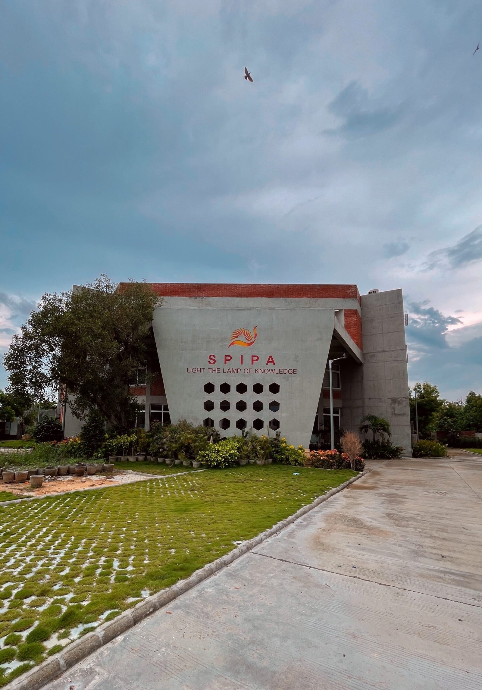 - SPIPA Regional Training Centre, Mehsana – Architecture & Design - SPIPA Mehsana Hub Architecture, Interior & Landscape - Regional Training Centre SPIPA Mehsana – Innovative Spaces - SPIPA Mehsana Campus: Learning Through Design - SPIPA Regional Training Centre, Mehsana – Design Excellence - Inspiring Learning & Living at SPIPA Mehsana - Integrated Architecture, Interior & Landscape for SPIPA - Front view of SPIPA Regional Training Centre Mehsana - Contemporary façade of SPIPA’s training centre - Inviting hostel interior with custom furnishings at SPIPA - Landscaped courtyard and green spaces at SPIPA Mehsana - Sustainable water feature in SPIPA’s campus landscape